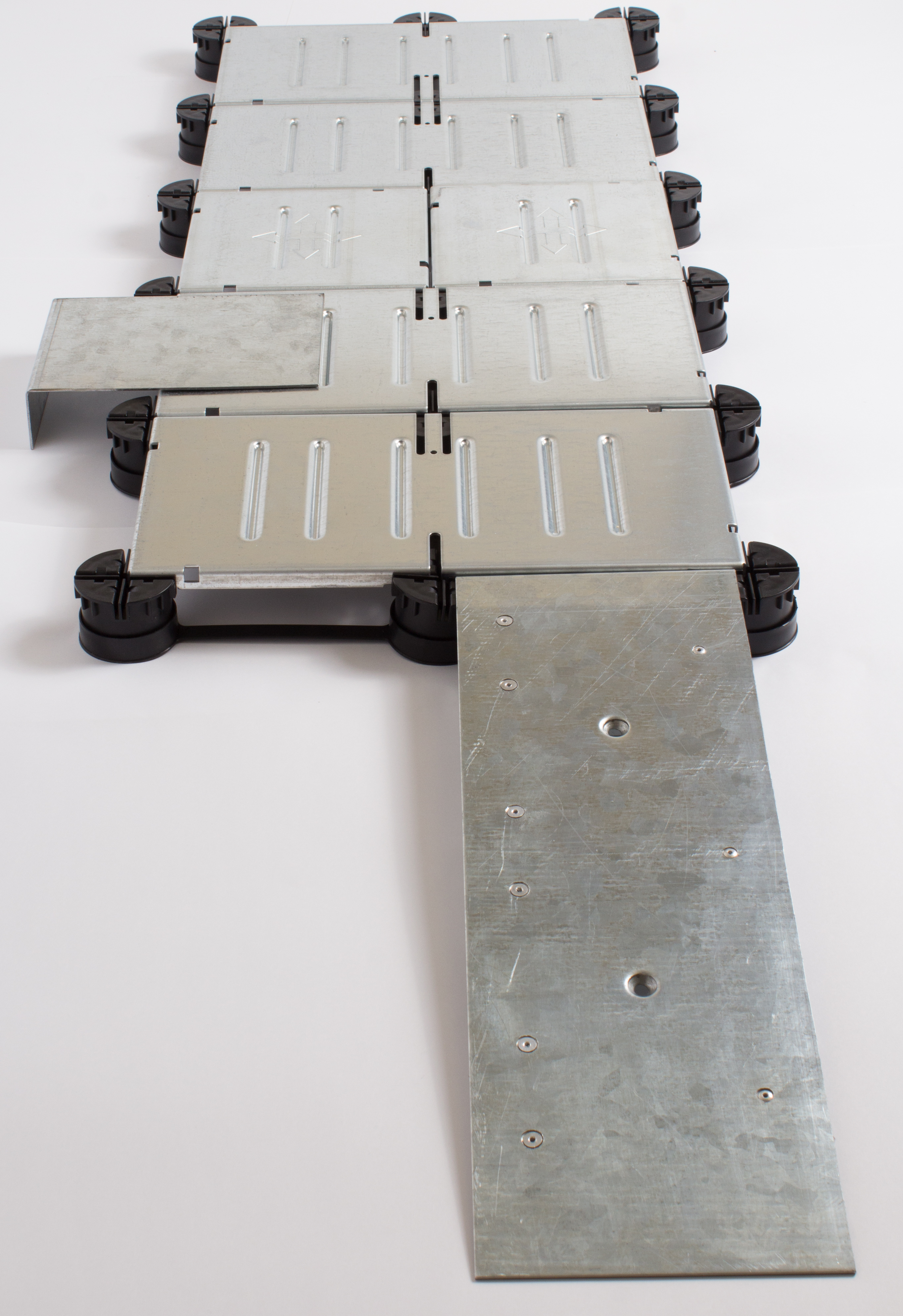 Sample of ramp, perimeter plate, and low profile flooring